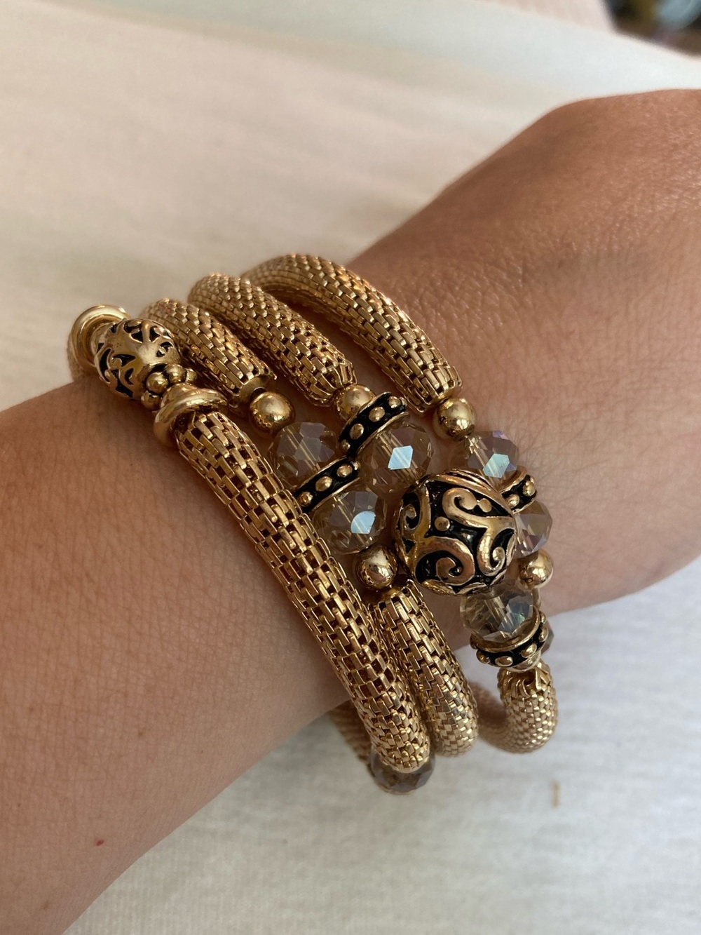 Mesh Gold Tone Coil Bracelet with Metal and Glass Crystal Beads